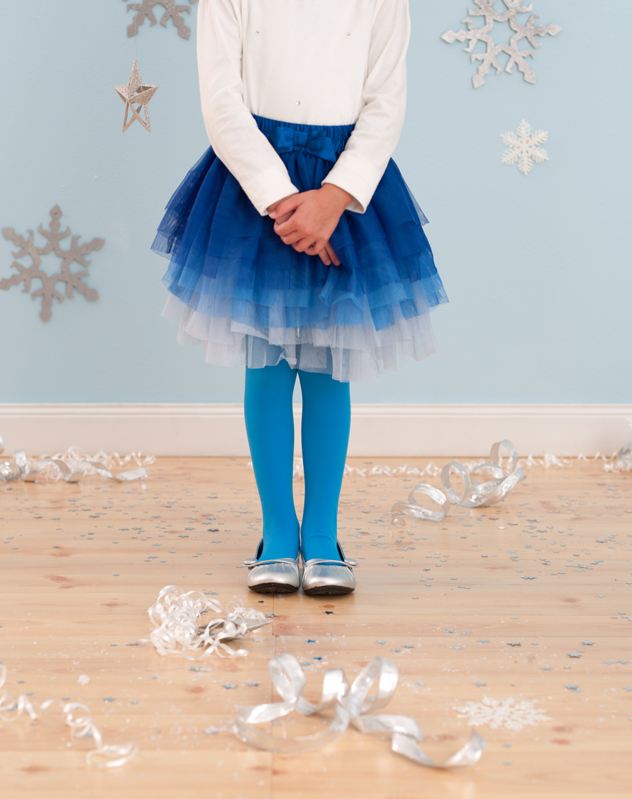 Parents magazine girl in party dress with snowflakes