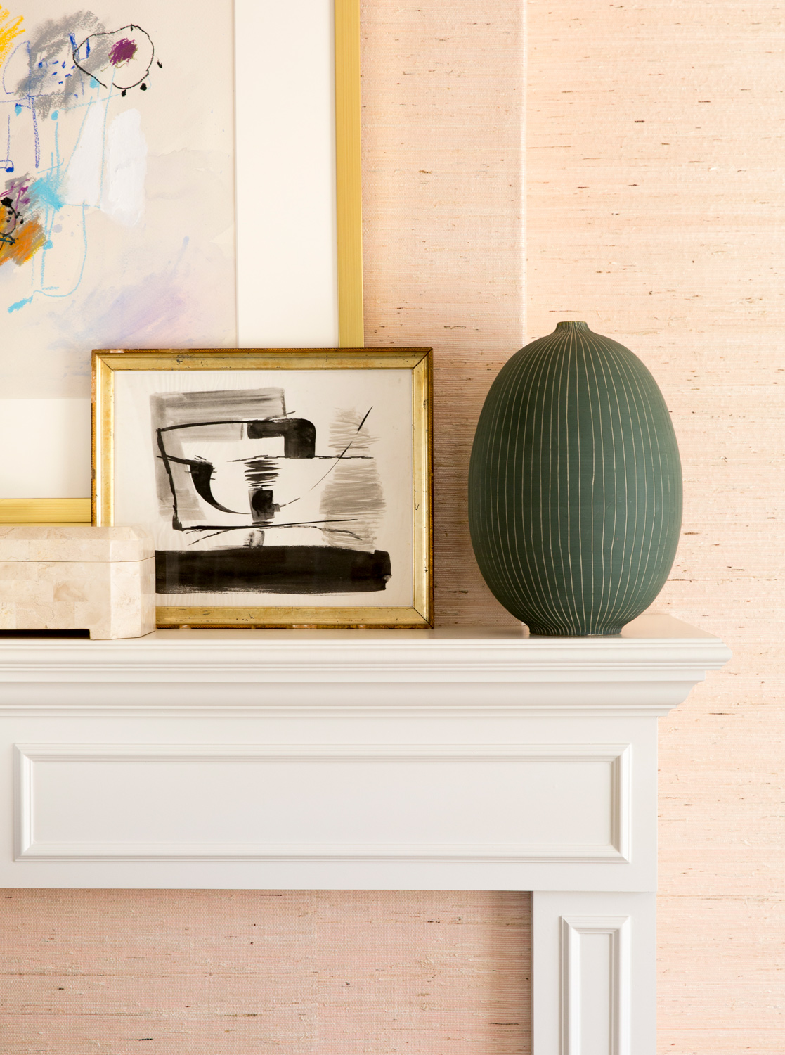 Art mantle by interior photographer Buff Strickland