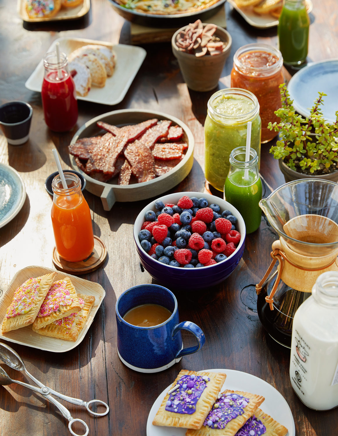 Breakfast spread on table in sunlight by lifestyle photographer Buff Strickland