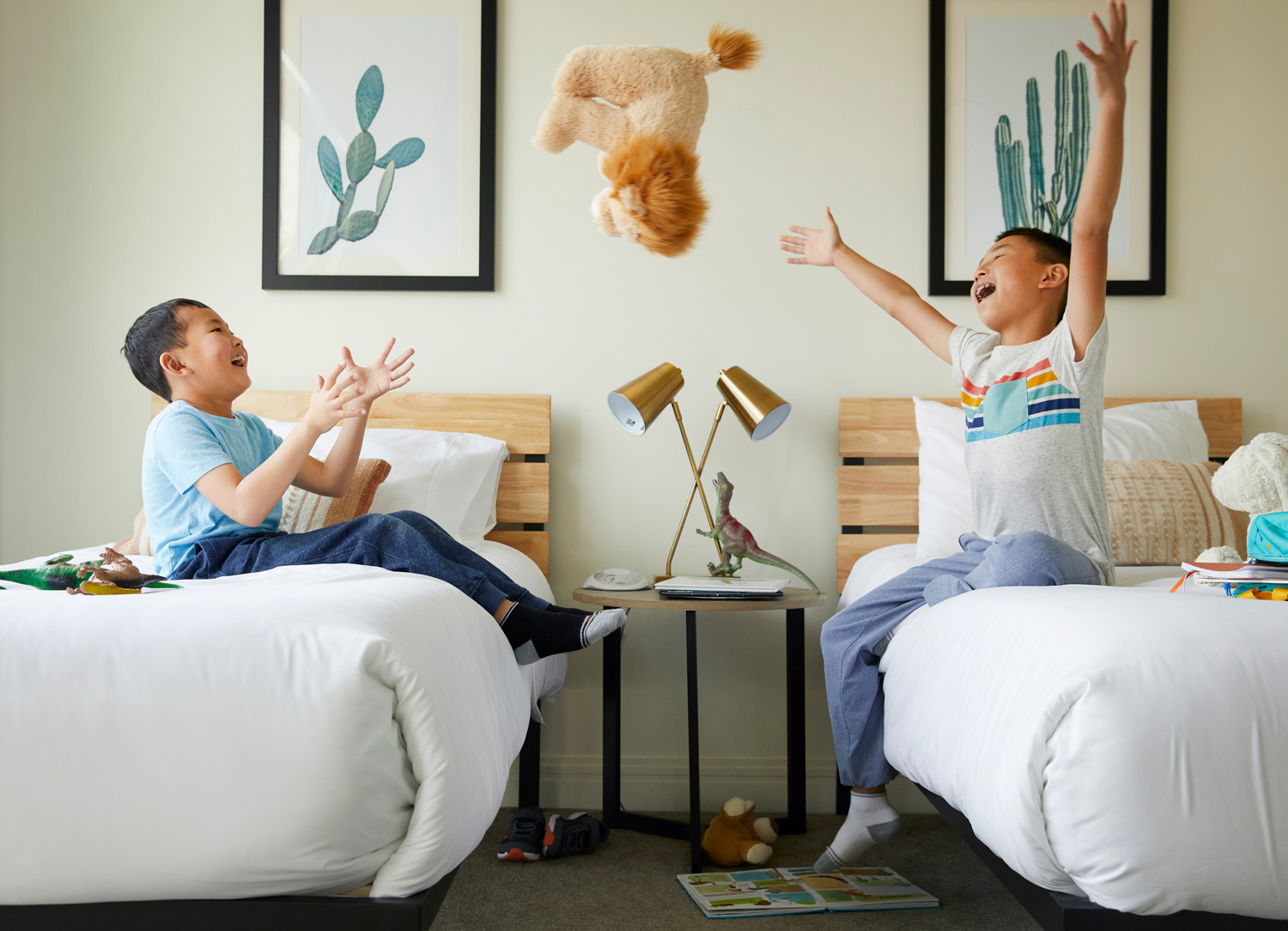 Brothers playing in their room by kids photographer Buff Strickland