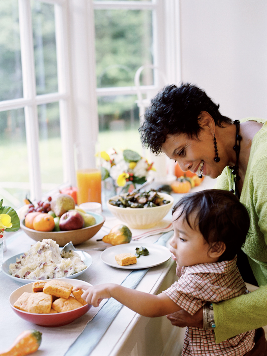 Grandmother and child at Thanksgiving buffet 