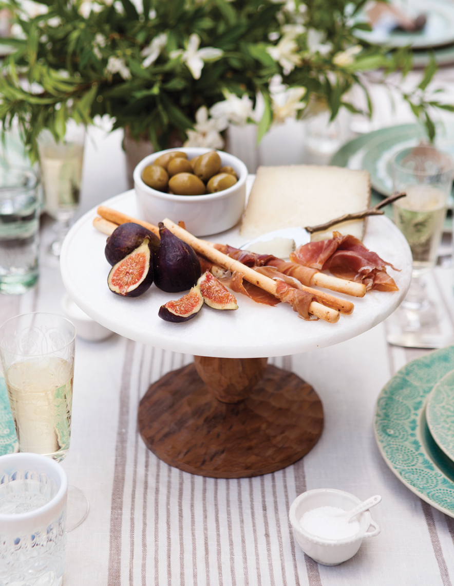 Camille Styles Entertaining spring tabletop cheese plate figs on Anthropologie plate breadsticks