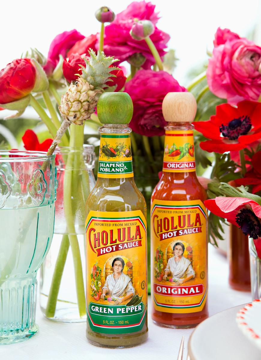 Camille Styles blog Cinco de Mayo Chalula hot sauce with flowers outside meals 