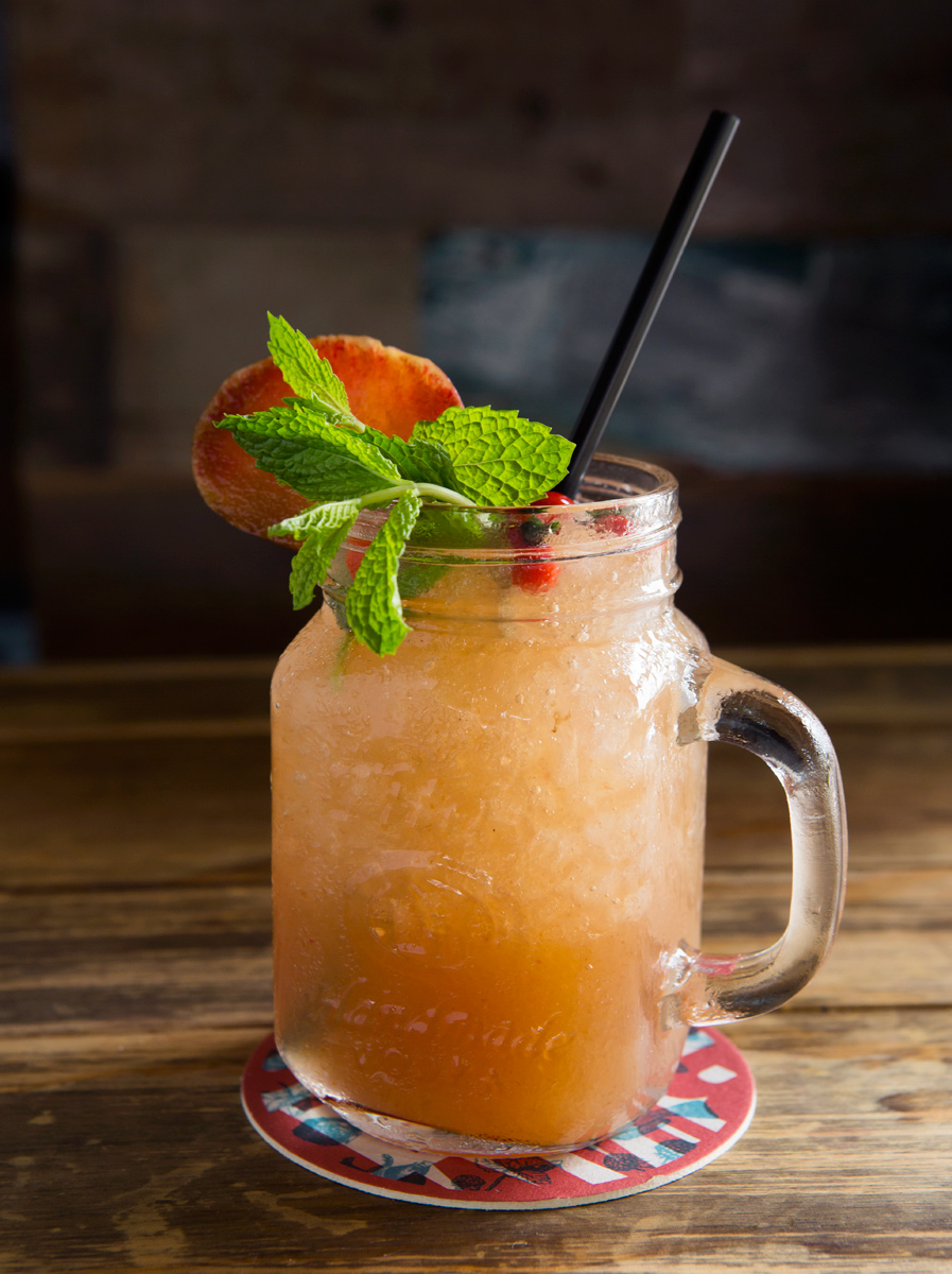 Austin food and beverage photographer Houston restaurants cocktail with mint