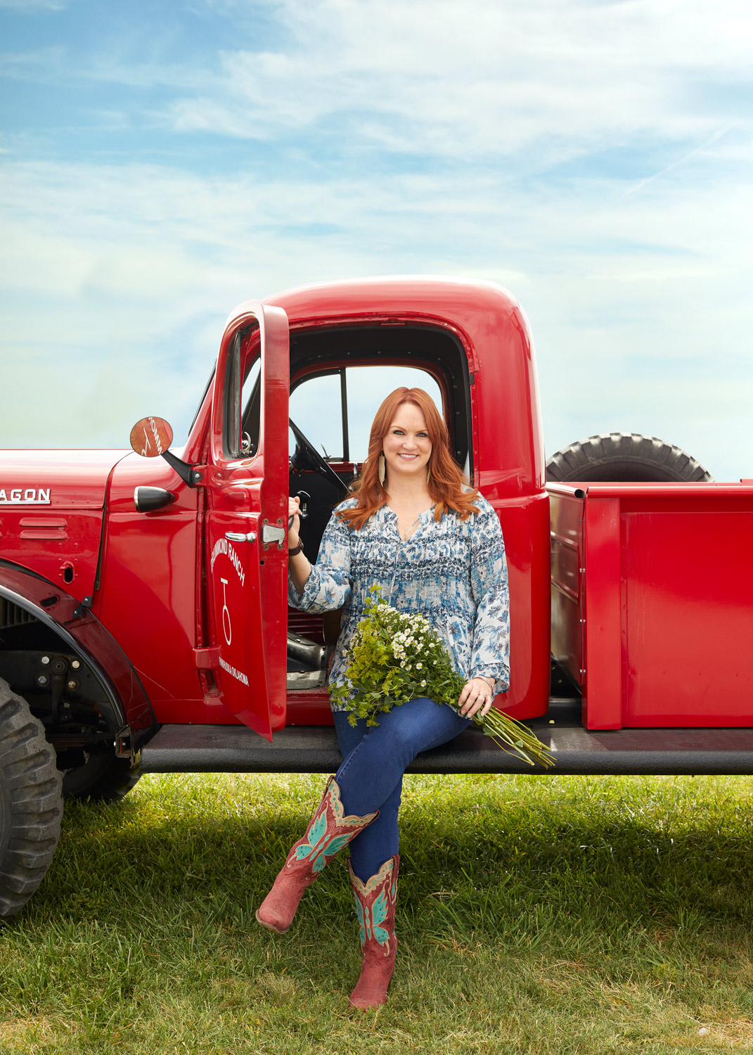 Ree Drummond and her red truck  by Austin photographer Buff Strickland photography