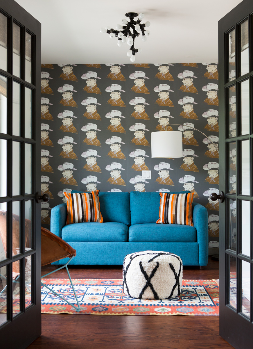 Eclectic interior in Austin Texas home with cowboy wallpaper by interior photographer Buff Strickland