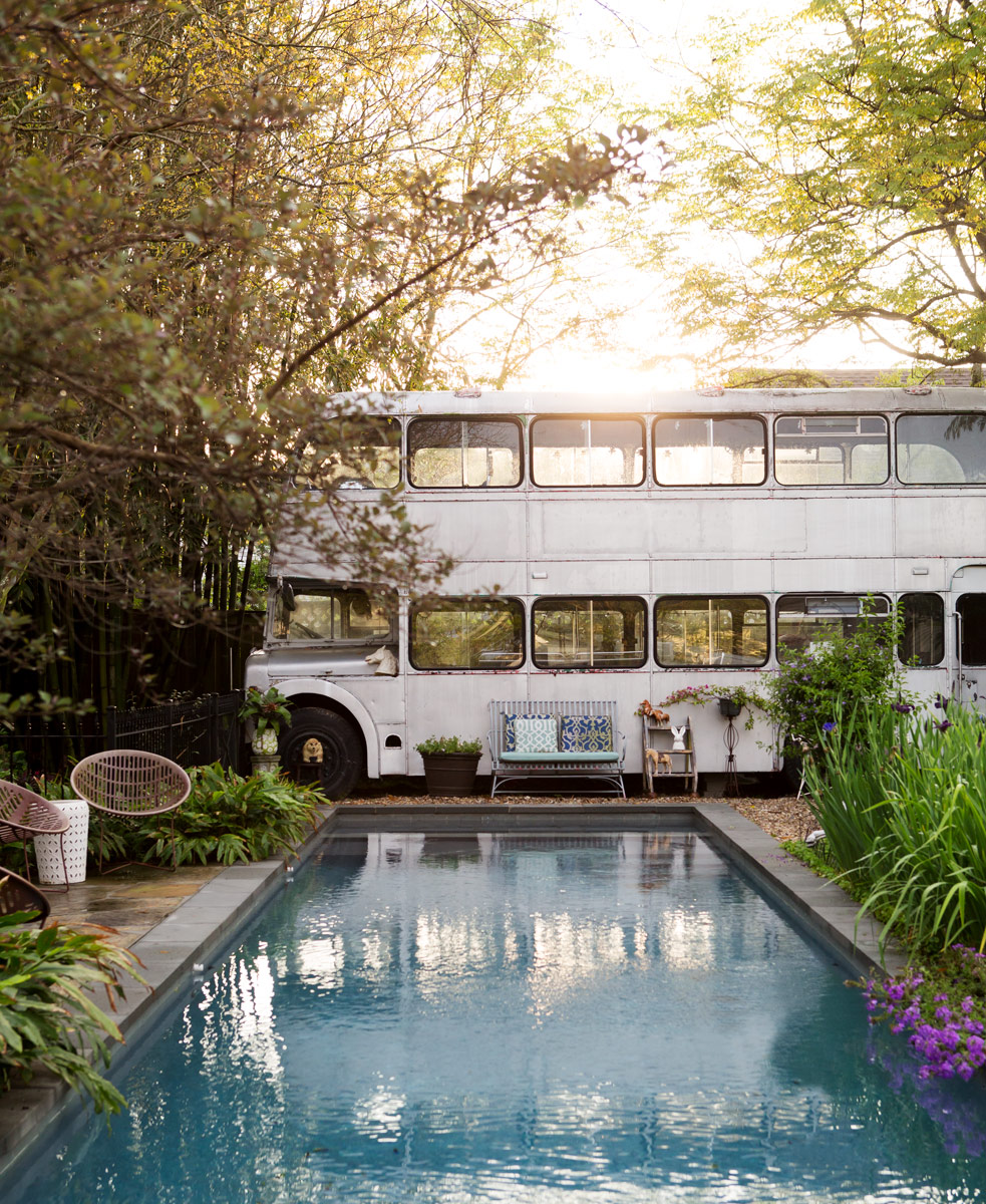 Funky New Orleans exterior of a bus by a pool by interior photographer Buff Strickland