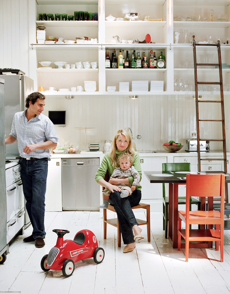 Couple in New York city loft apartment kitchen
